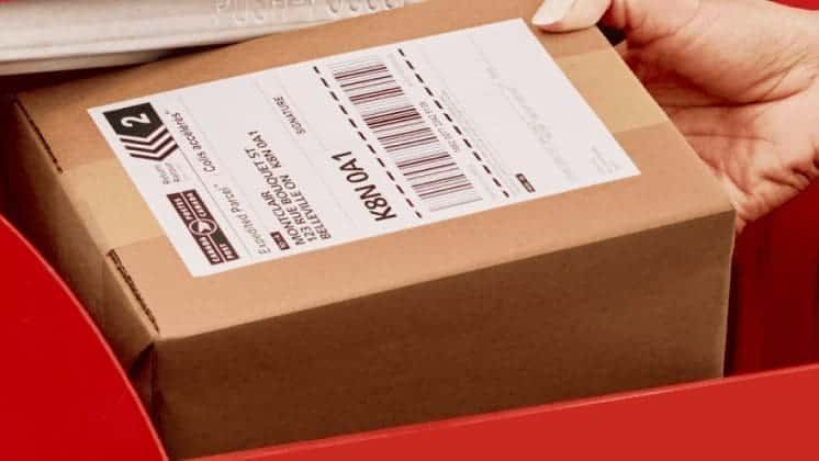 Canada Post package prepared for shipping from Canada to Cuba with customs documents and complete address